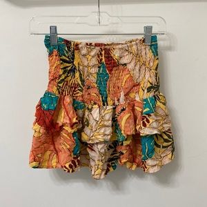 Cute floral design skirt. Smoked on the top and ruffled on the bottom